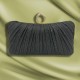 Black Pleats holding a party bag