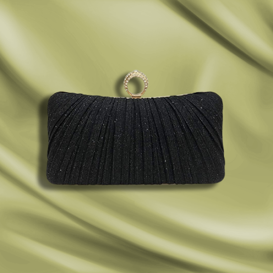 Black Pleats holding a party bag